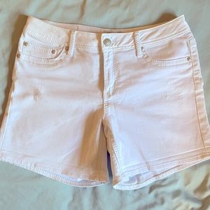 White distressed shorts